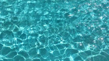 波及水表面游泳池蓝色的水表面背景